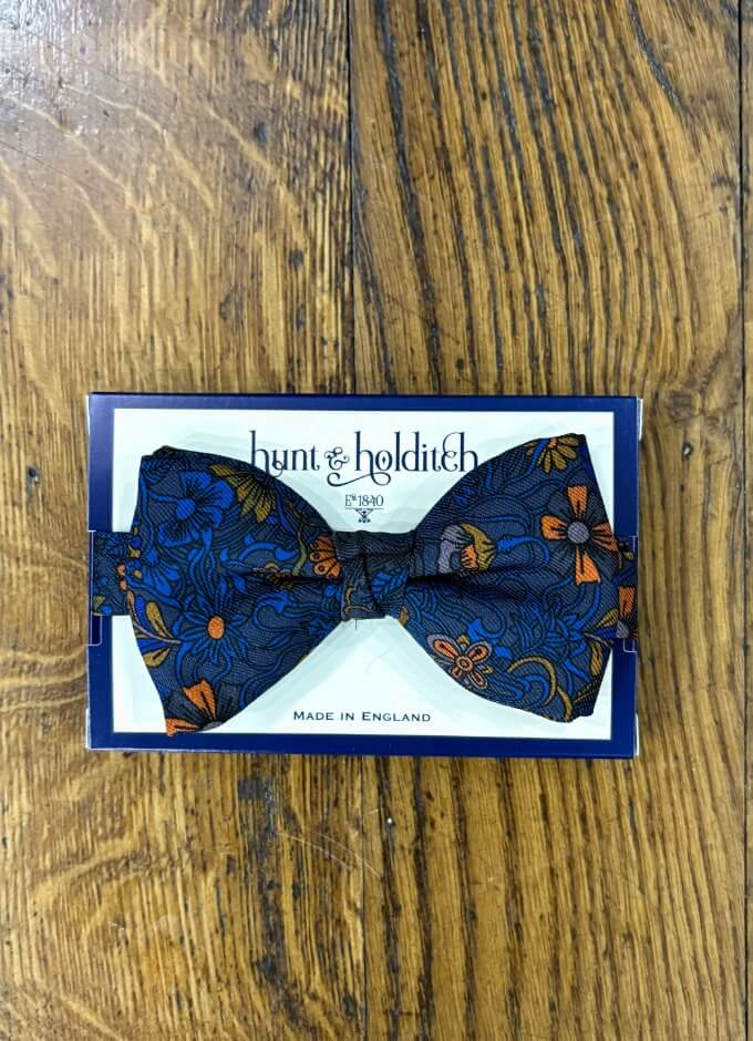 Pre Tied English Printed Silk Bow Tie | Orange/Brown Floral Navy Background